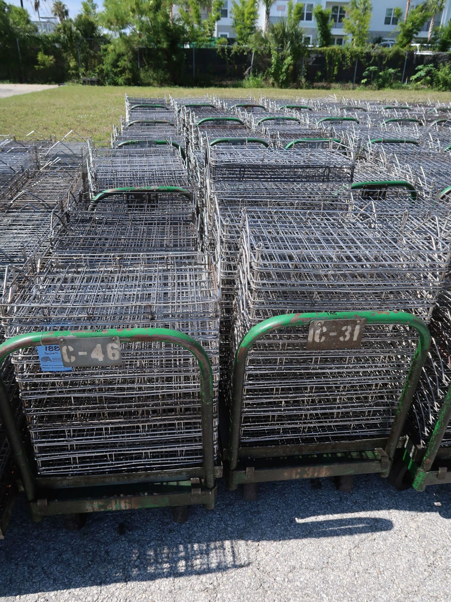 WAREHOUSE CARTS WITH (APPROX.) (40) 22" X 12" X 2" SS WASH BASKETS EACH