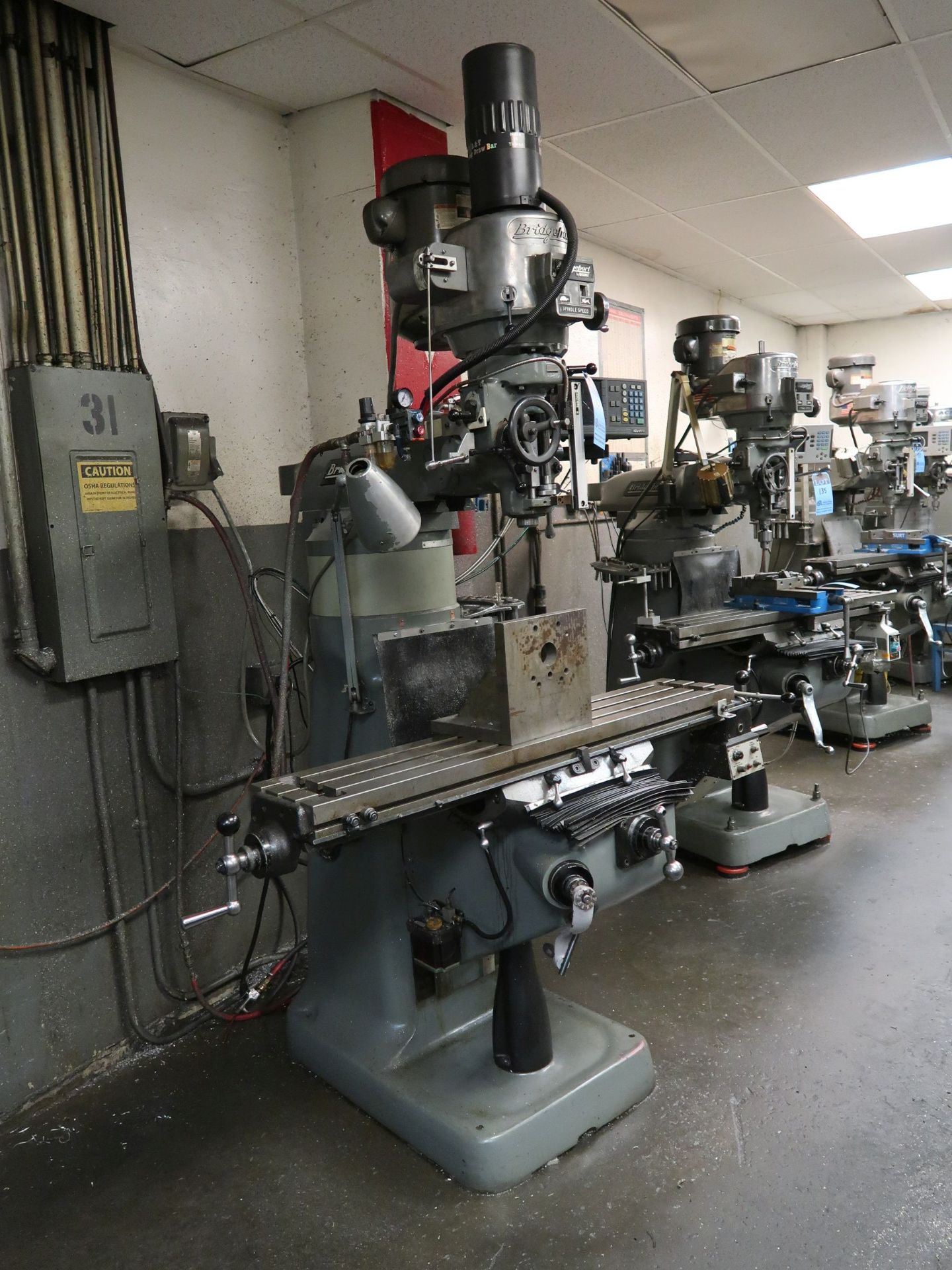 2 HP BRIDGEPORT VERTICAL MILLING MACHINE; S/N HDNG0114, SPINDLE SEEP 60-4,200 RPM, 9" X 42" POWER