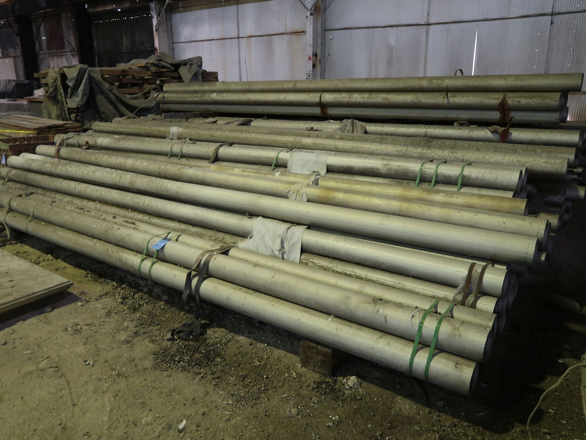 LARGE QUANTITY STAINLESS STEEL MATERIAL INCLUDING 6" DIAMETER X 20' LONG PIPE, 3" PIPE, ASSORTED
