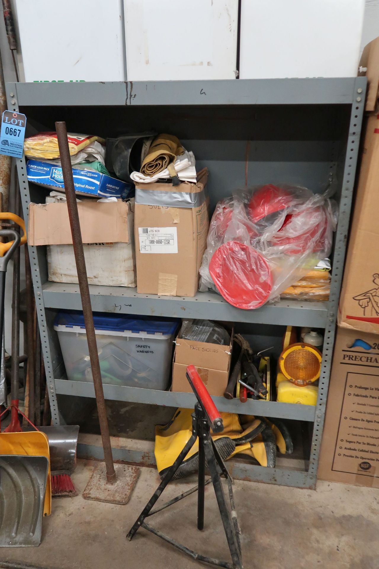 CONTENTS OF SHELF INCLUDING SAFETY EQUIPMENT AND FIRST AID CABINETS