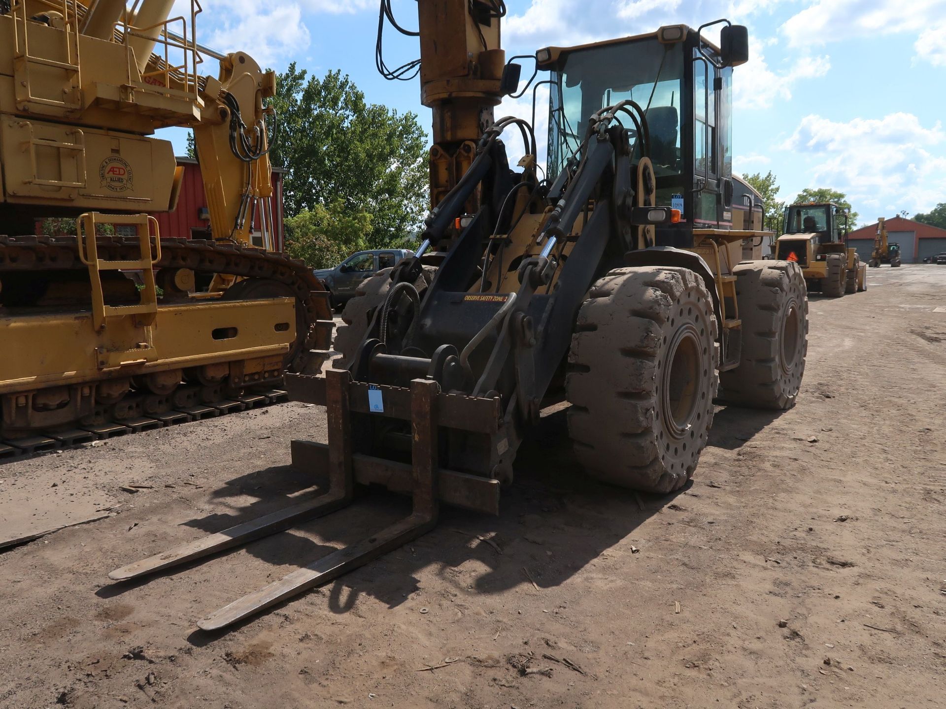 2002 CATERPILLAR MODEL IT28G ARTICULATING RUBBER TIRE WHEEL LOADER; S/N 4TF76145 OR CAT