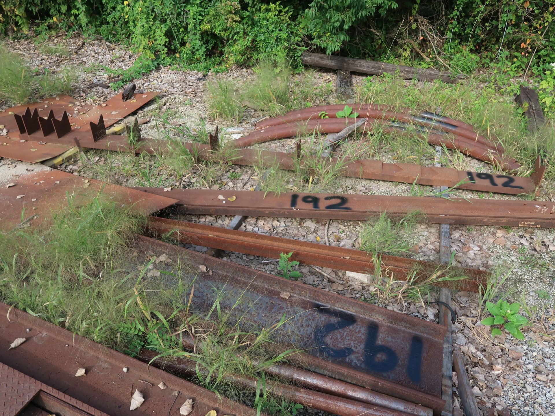 (LOT) MISC. STEEL PLATE ON GROUND W/ MISC. SCRAP STEEL AT END OF ROW (BLACK PAINT) - Image 6 of 6