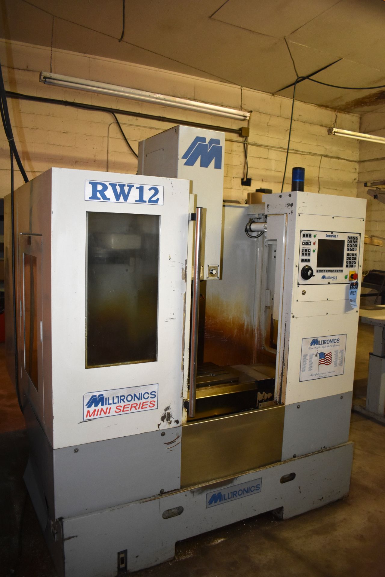 MILLTRONICS MODEL RW12 CNC VERTICAL MACHINING CENTER; S/N 7558, TOOL CHANGER REMOVED FROM MACHINE (