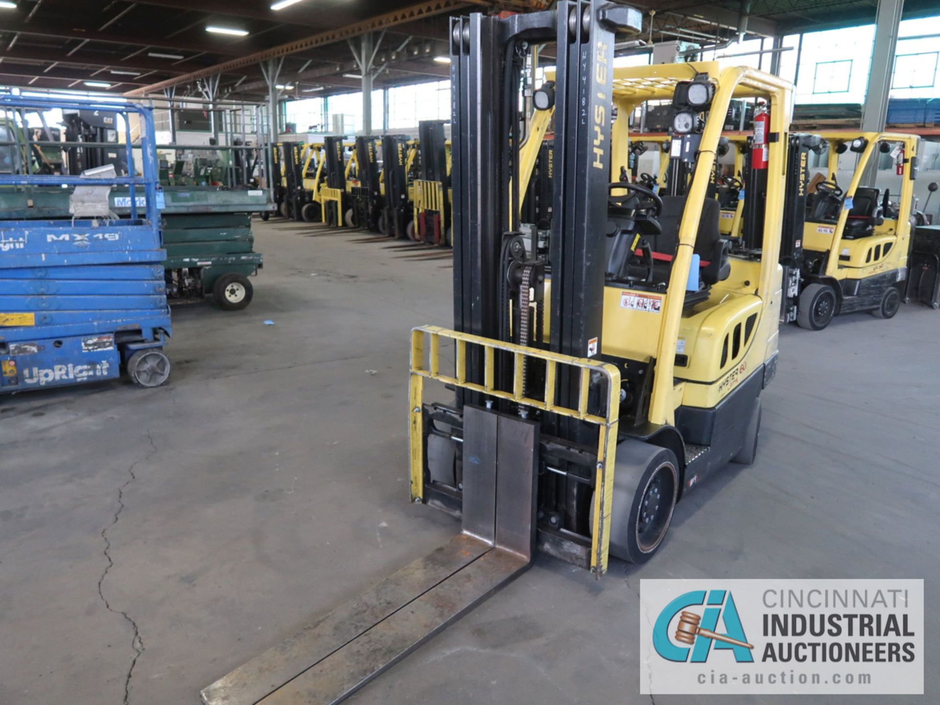 6,000 LB HYSTER MODEL S60FT LP GAS SOLID TIRE LIFT TRUCK WITH 3-STAGE MAST, 188" LIFT HEIGHT, 84"