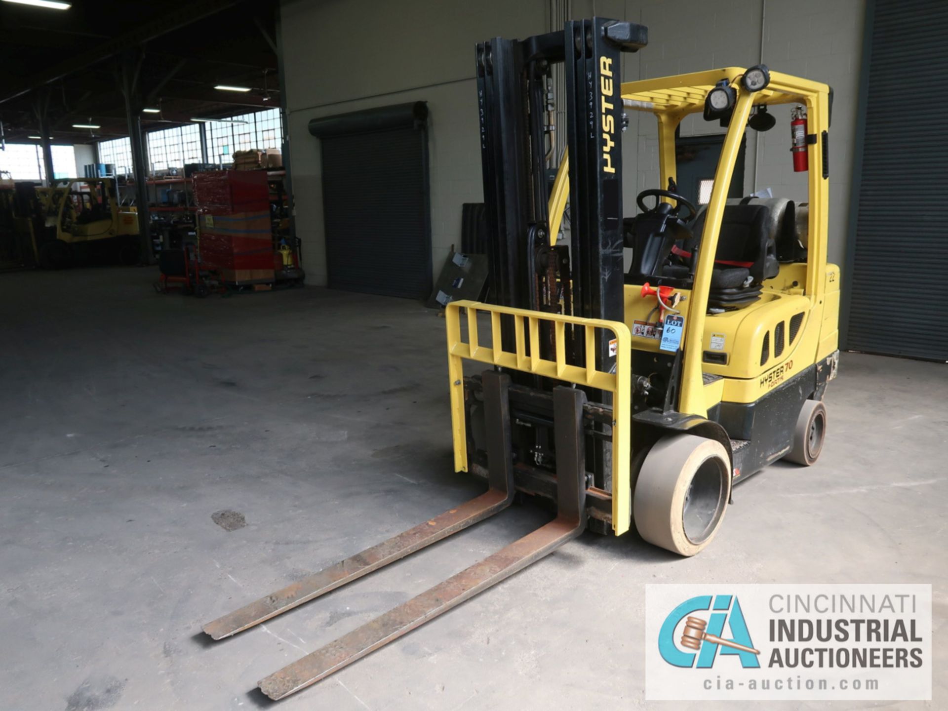 7,000 LB HYSTER MODEL S70FT LP GAS SOLID TIRE LIFT TRUCK WITH 3-STAGE MAST, 188" LIFT HEIGHT, 84"