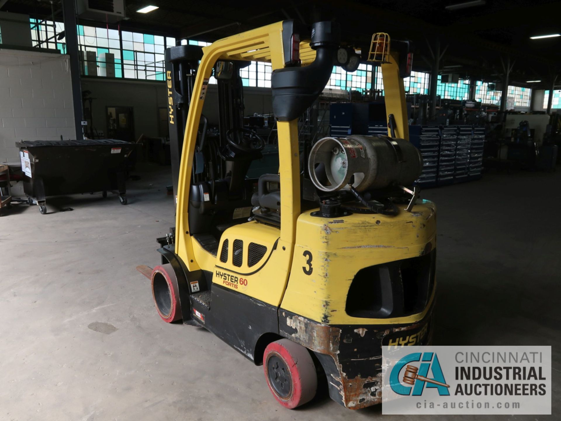 6,000 LB HYSTER MODEL S60FT LP GAS SOLID TIRE LIFT TRUCK WITH 3-STAGE MAST, 187" LIFT HEIGHT, 84" - Image 7 of 11