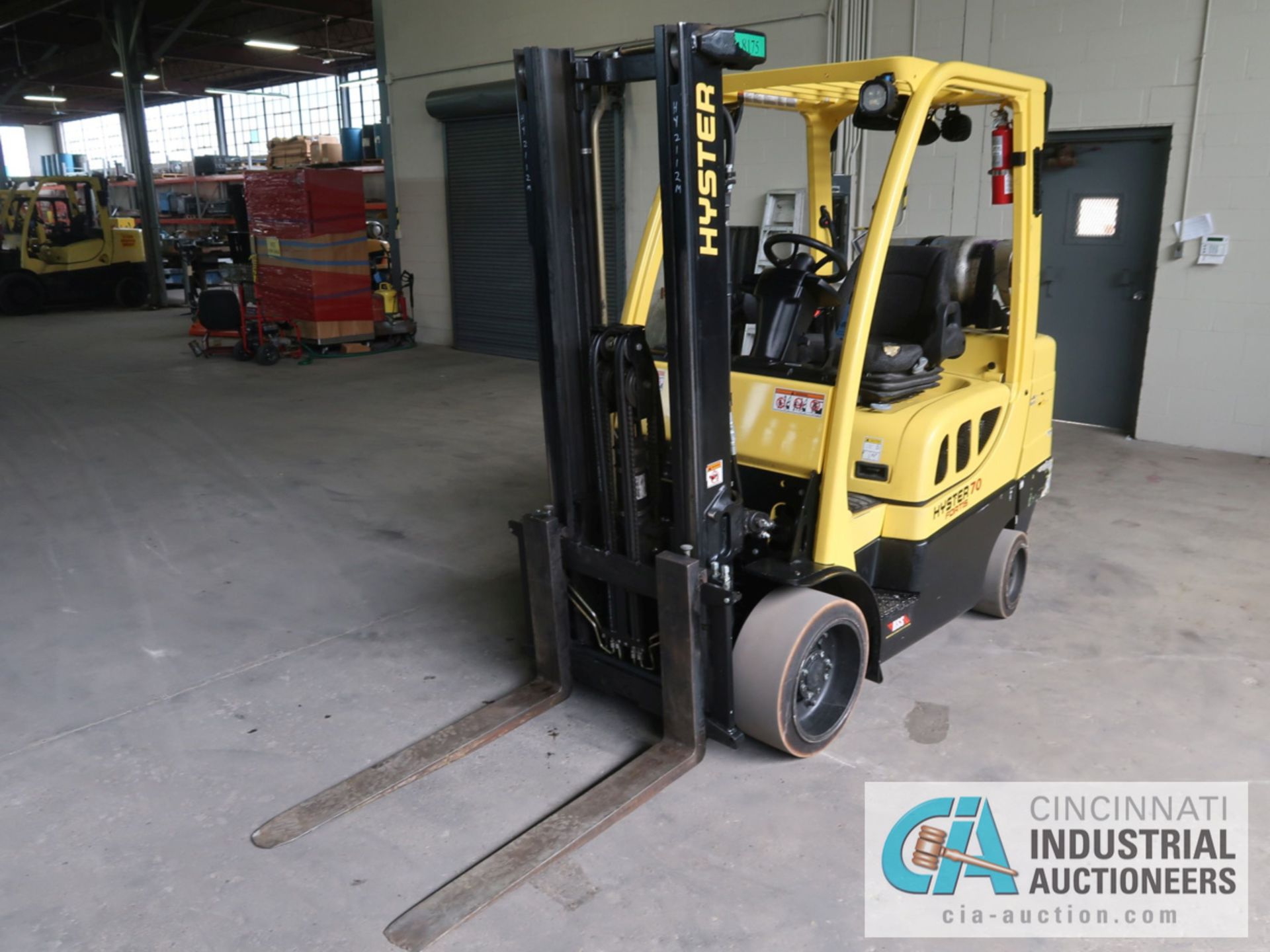 7,000 LB HYSTER MODEL S70FT LP GAS SOLID TIRE LIFT TRUCK WITH 2-STAGE MAST, 122" LIFT HEIGHT, 80"