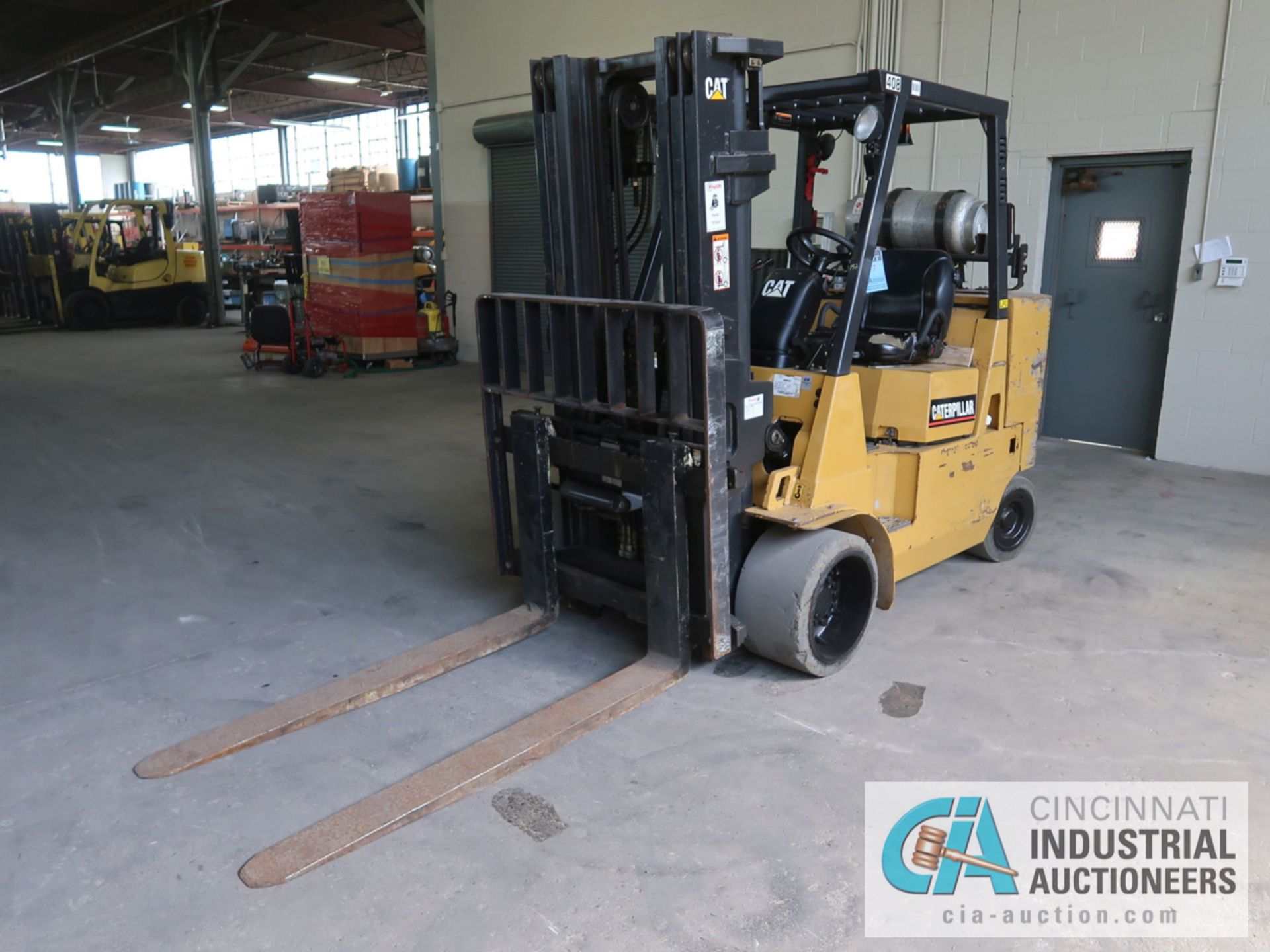 11,000 LB CATERPILLAR MODEL GC55K LP GAS SOLID TIRE FORKLIFT, S/N AT88A00314, 3-STAGE MAST, 82" MAST