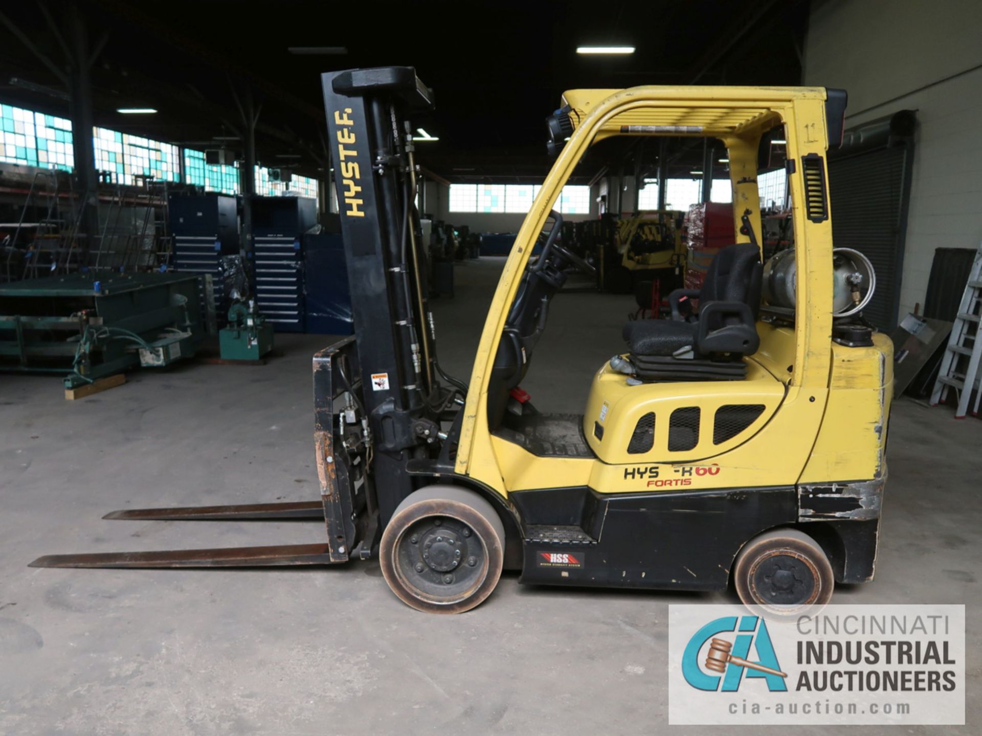 6,000 LB HYSTER MODEL S60FT LP GAS SOLID TIRE LIFT TRUCK WITH 3-STAGE MAST, 187" LIFT HEIGHT, 84" - Image 8 of 11