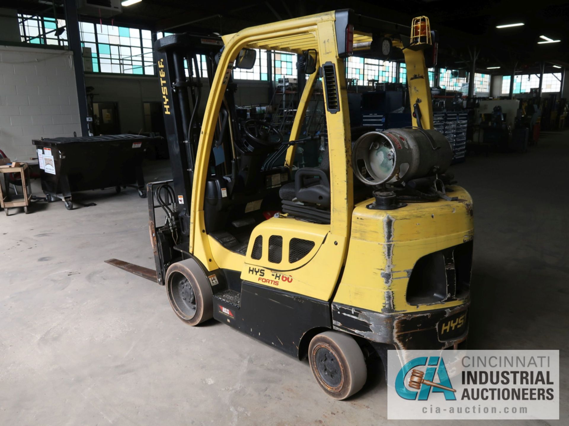 6,000 LB HYSTER MODEL S60FT LP GAS SOLID TIRE LIFT TRUCK WITH 3-STAGE MAST, 187" LIFT HEIGHT, 84" - Image 7 of 11