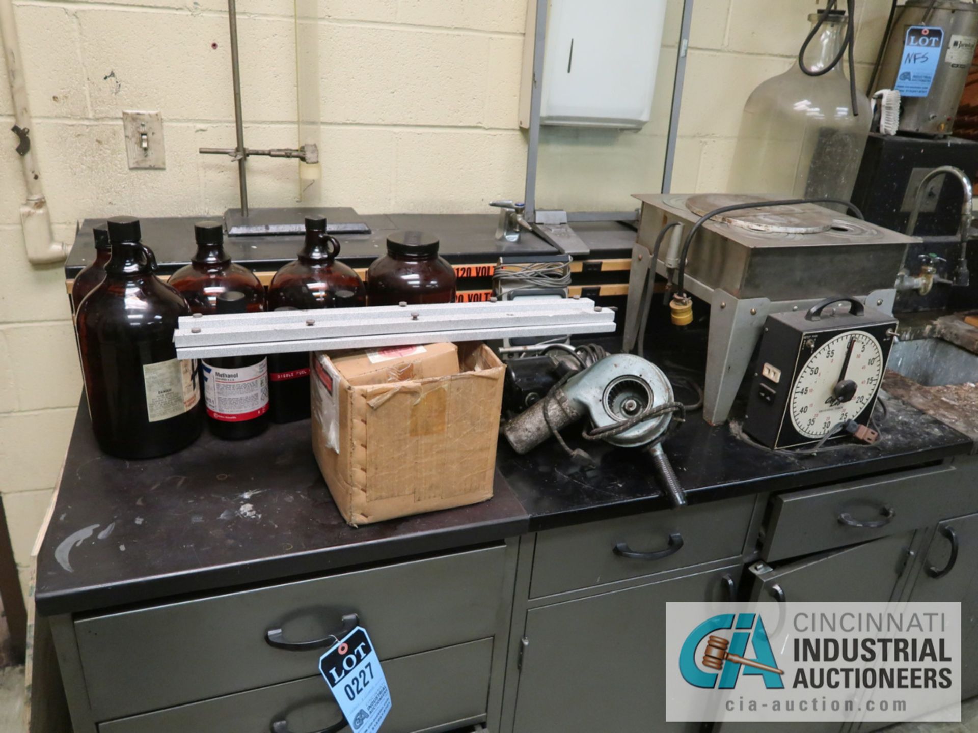 CABINET AND CONTENTS IN LAB INCLUDING MISCELLANEOUS LAB GLASS, BALANCERS, SAMPLING TOOLS, HOT PLATE