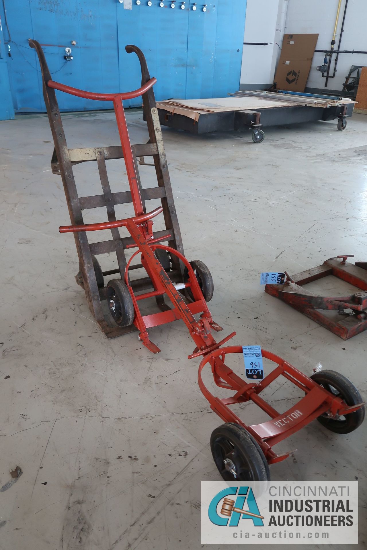 (2) 100 LB. MECO OIL DRUM DOLLY AND (1) TWO-WHEEL DOLLY