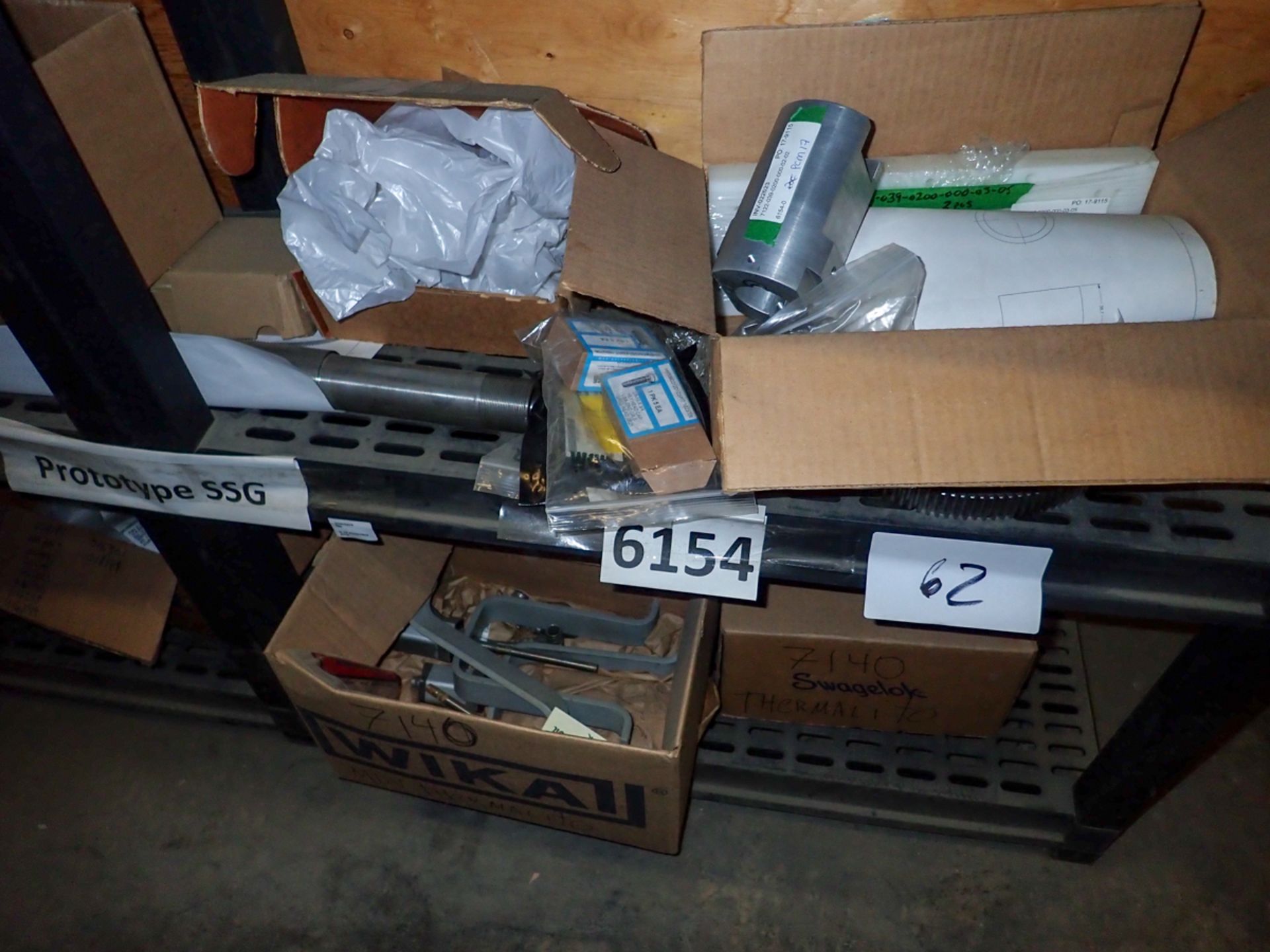 LOT OF ASSORTED PARTS (2 SHELVES)