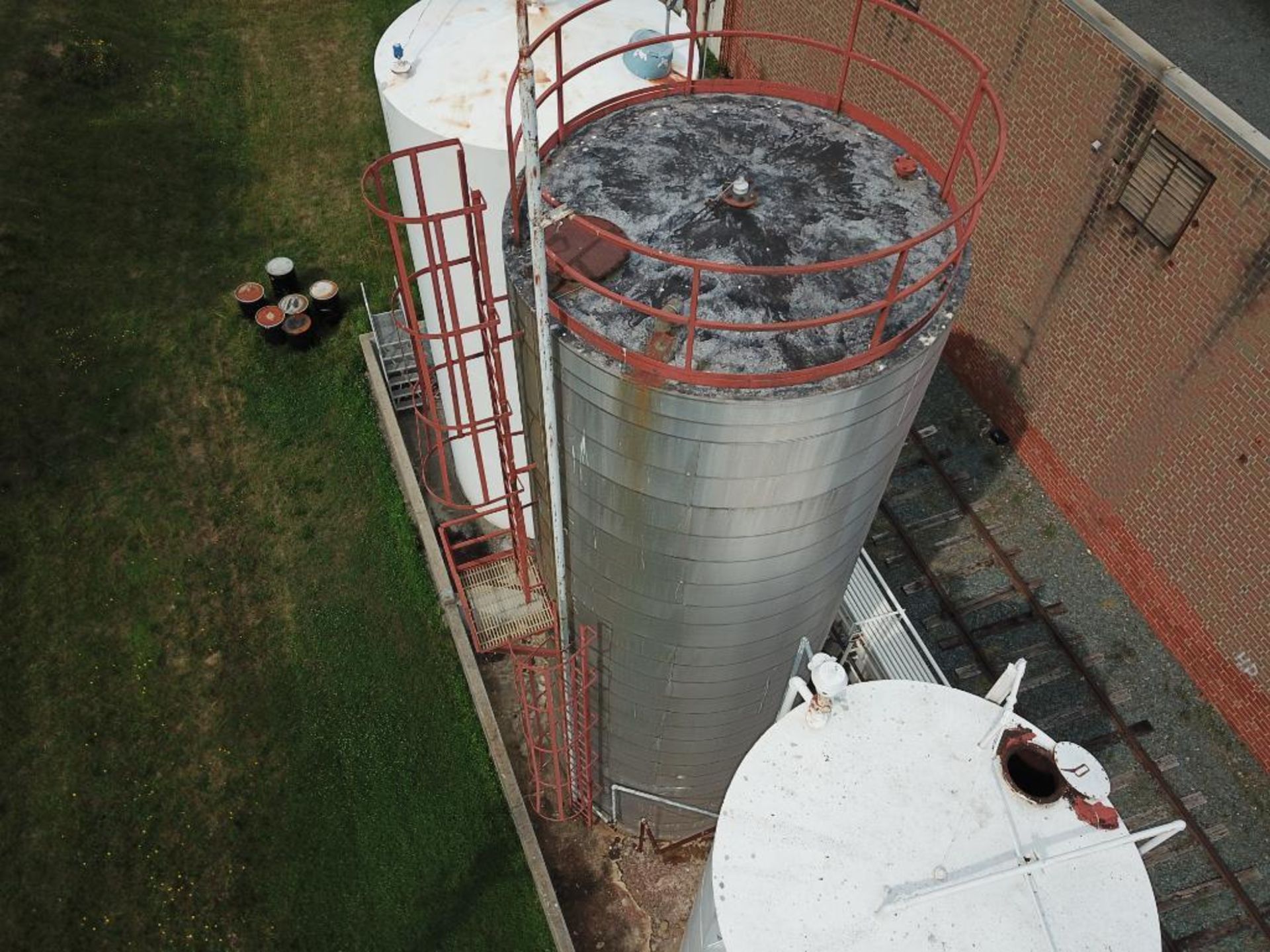 30,000 gallon heated, jacketed tank & 5880g stainless tank