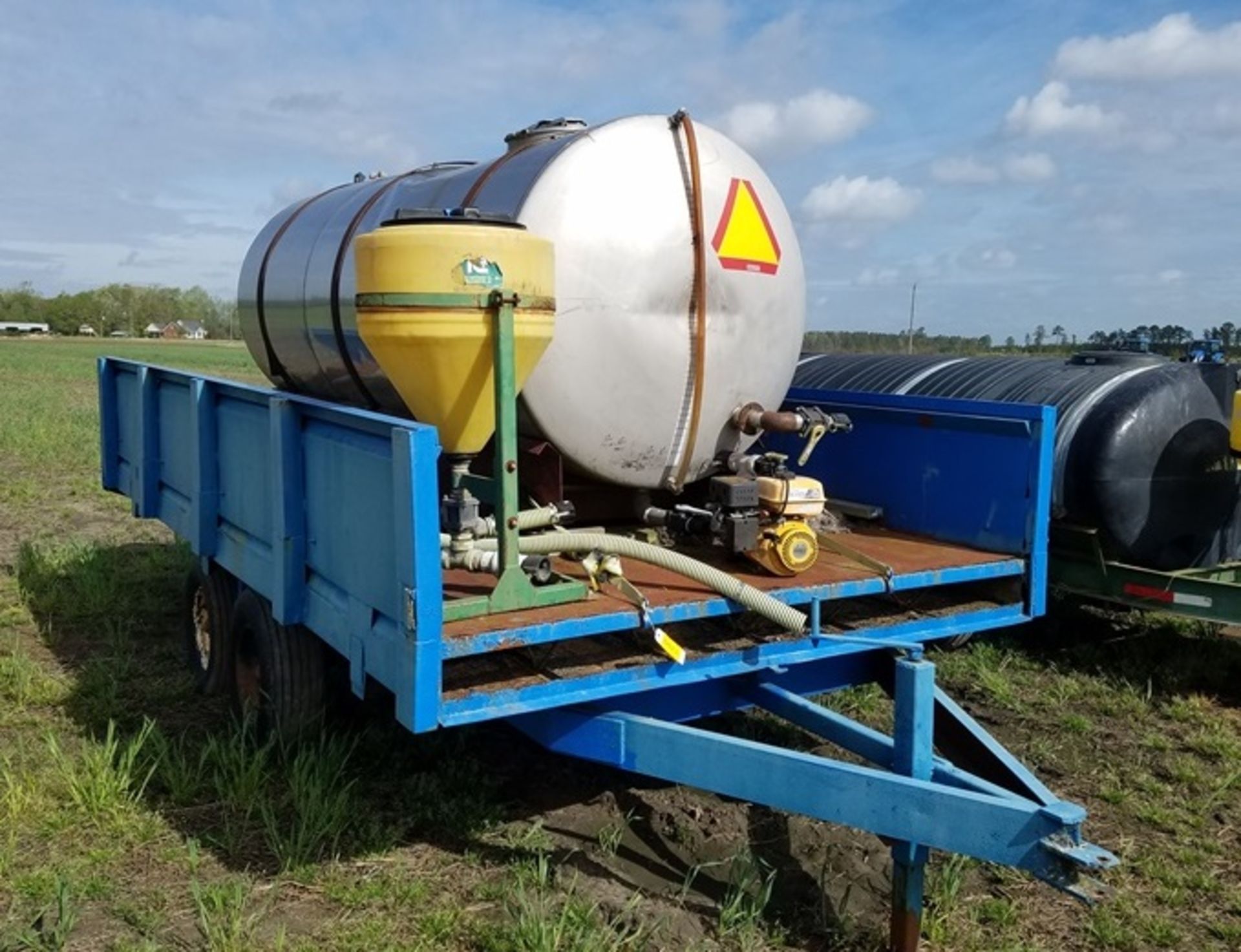 Peanut Trailer converted w/1300 gal SS tank, pump, and mixing tank