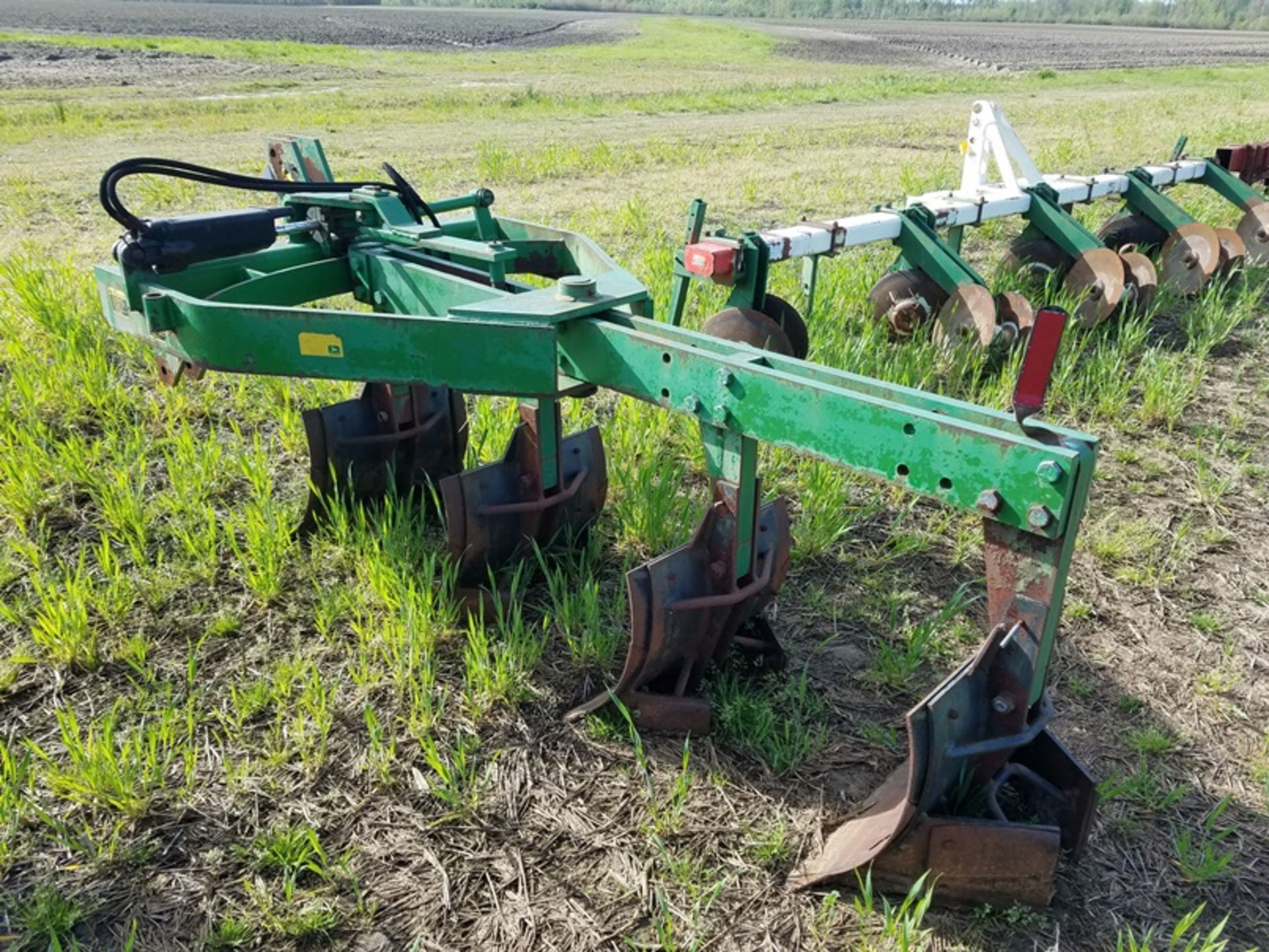 JD 3945 4 bottom switch plow missing tail wheel - Image 3 of 4