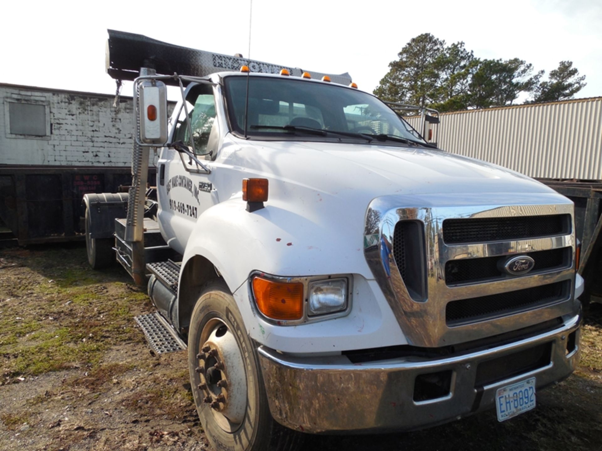 2006 FORD F750 diesel, auto w/STELLAR Shuttle Stellar hook lift body, 279,595 milesvin#