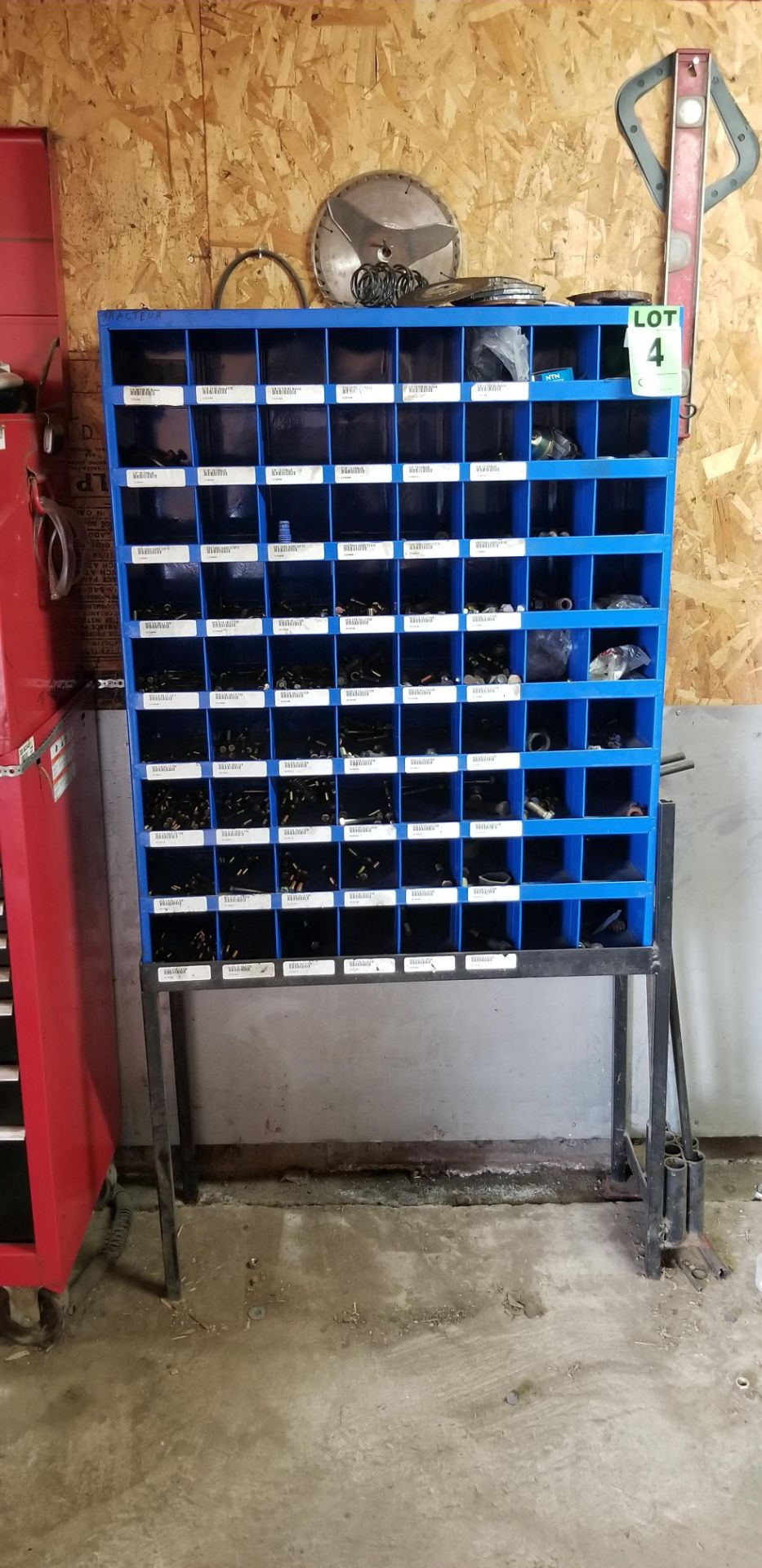 (1) Bolted metal shelf with 72 bins