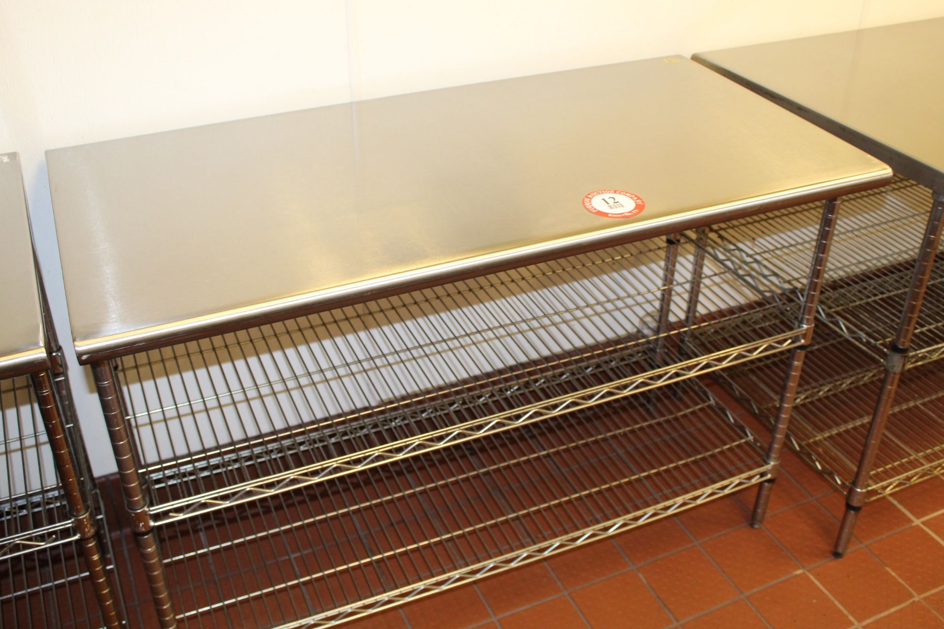 Stainless Steel Table w/ Adjustable Shelves, 24" x 48"