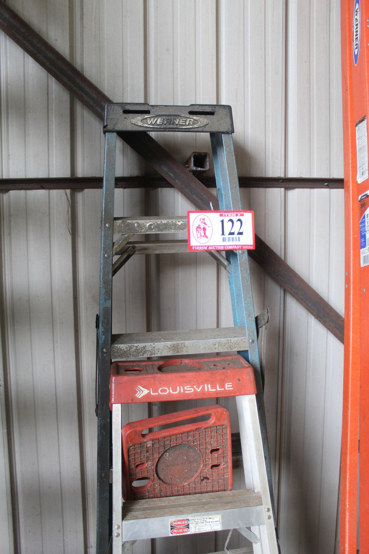 (1) Werner 6' Fiberglass Step Ladder and (1) Louisville 4' Aluminum Step Ladder