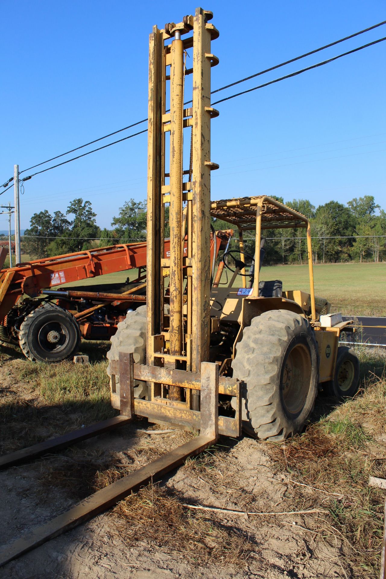 Warner & Swasey Model 1600LD Rough Terrain Forklift, Gas, 6000lb Capacity, 366" Lift Height, 3 Stage