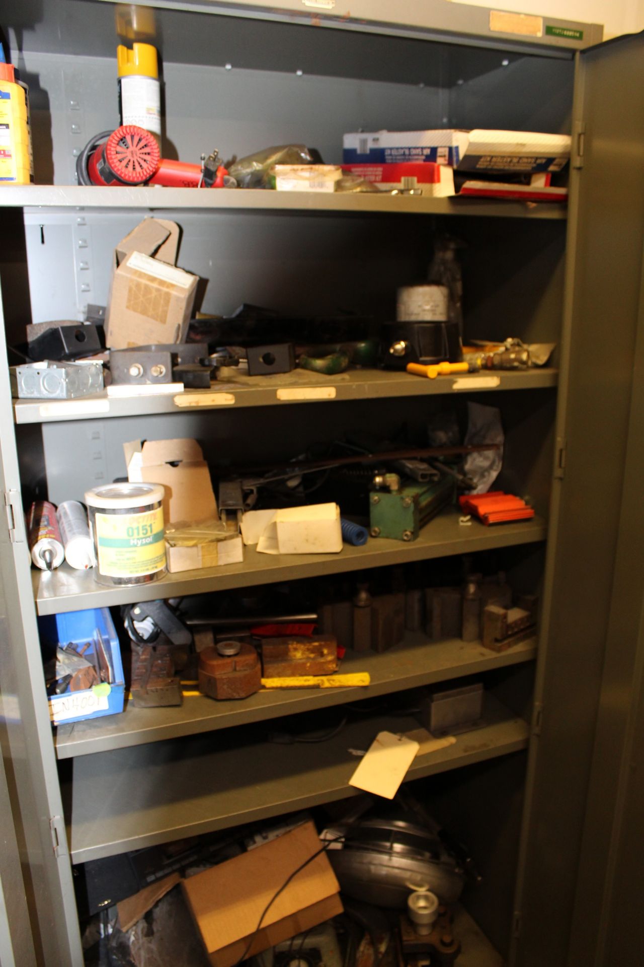 (2) Metal Storage Cabinets & Contents To Include: Heat Gun, Caulking, Glue, Machine Tools, Dies,