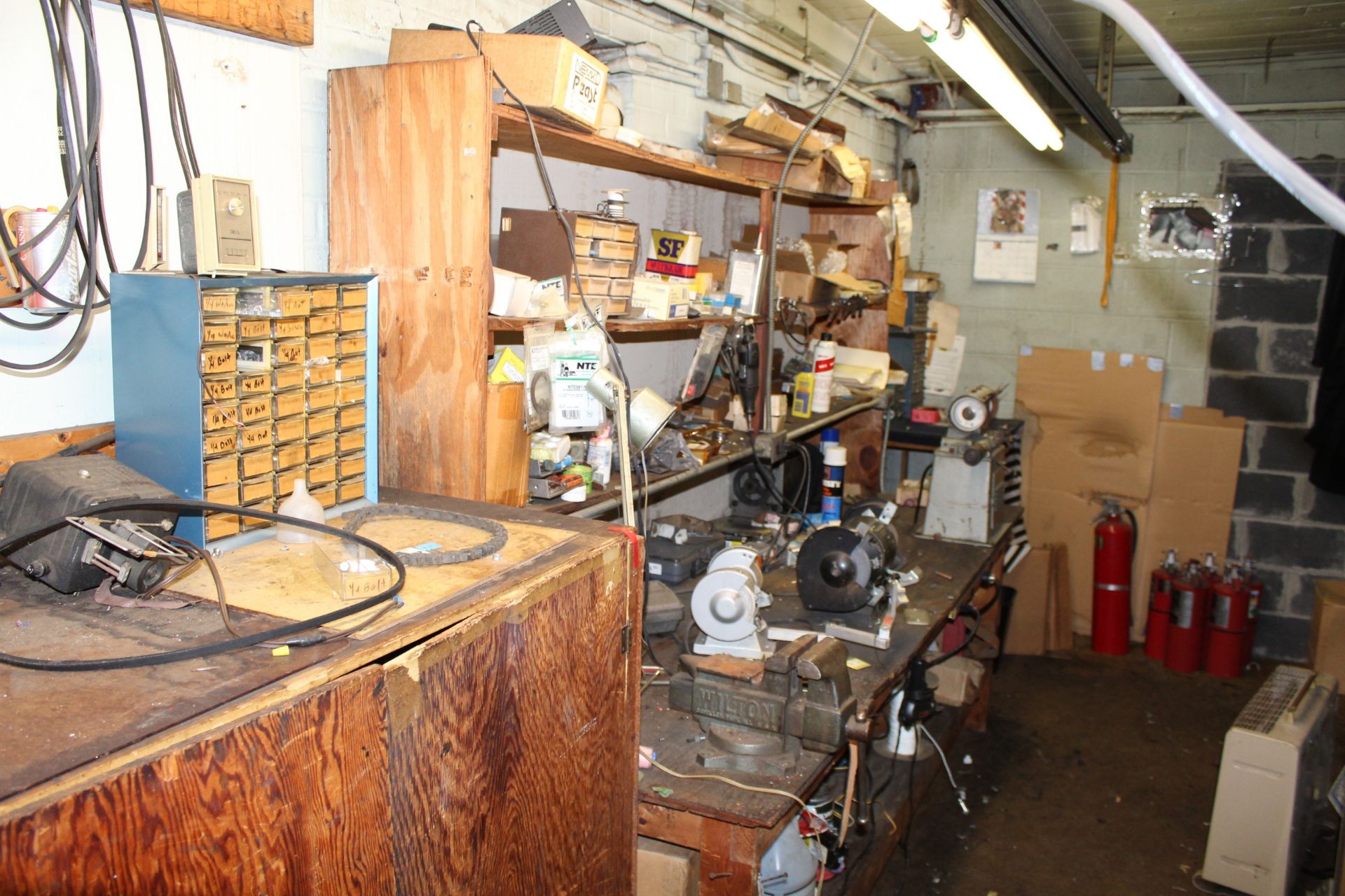 Contents of Maintenance Shop: (2) Double Pedestal Grinders (1) United Cloth Cutting Tool