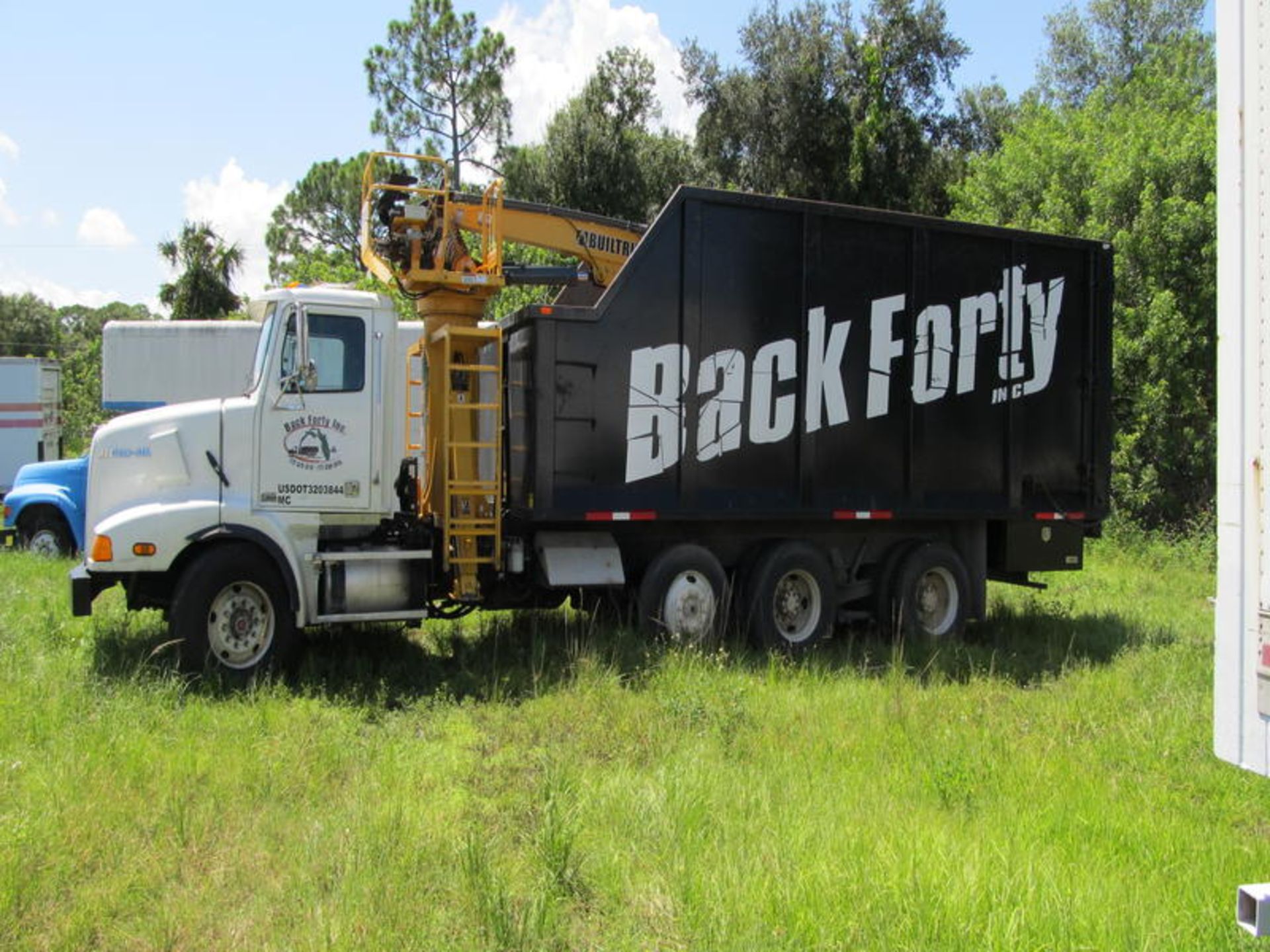 2001 Western Star 5800 Tri-Axle Grapple Truck