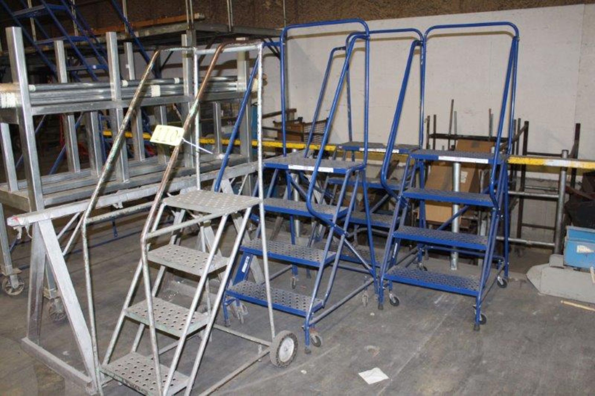 Lot of 4 Ft. Rolling Step Ladders