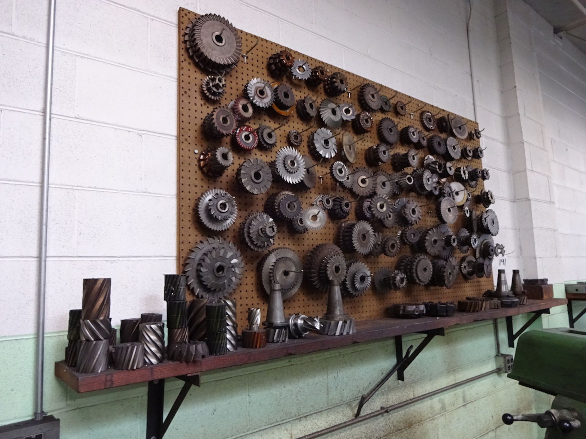LOT: ASSORTED MILLING CUTTERS ON WALL
