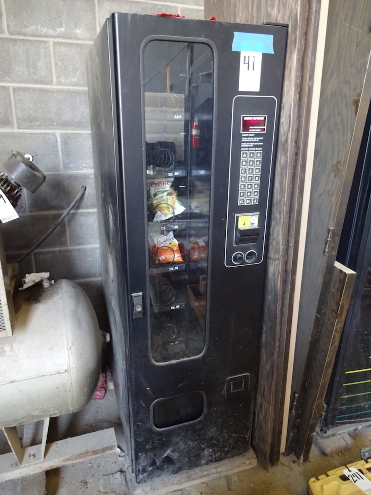 SNACK VENDING MACHINE, ACCEPTS DOLLAR BILLS