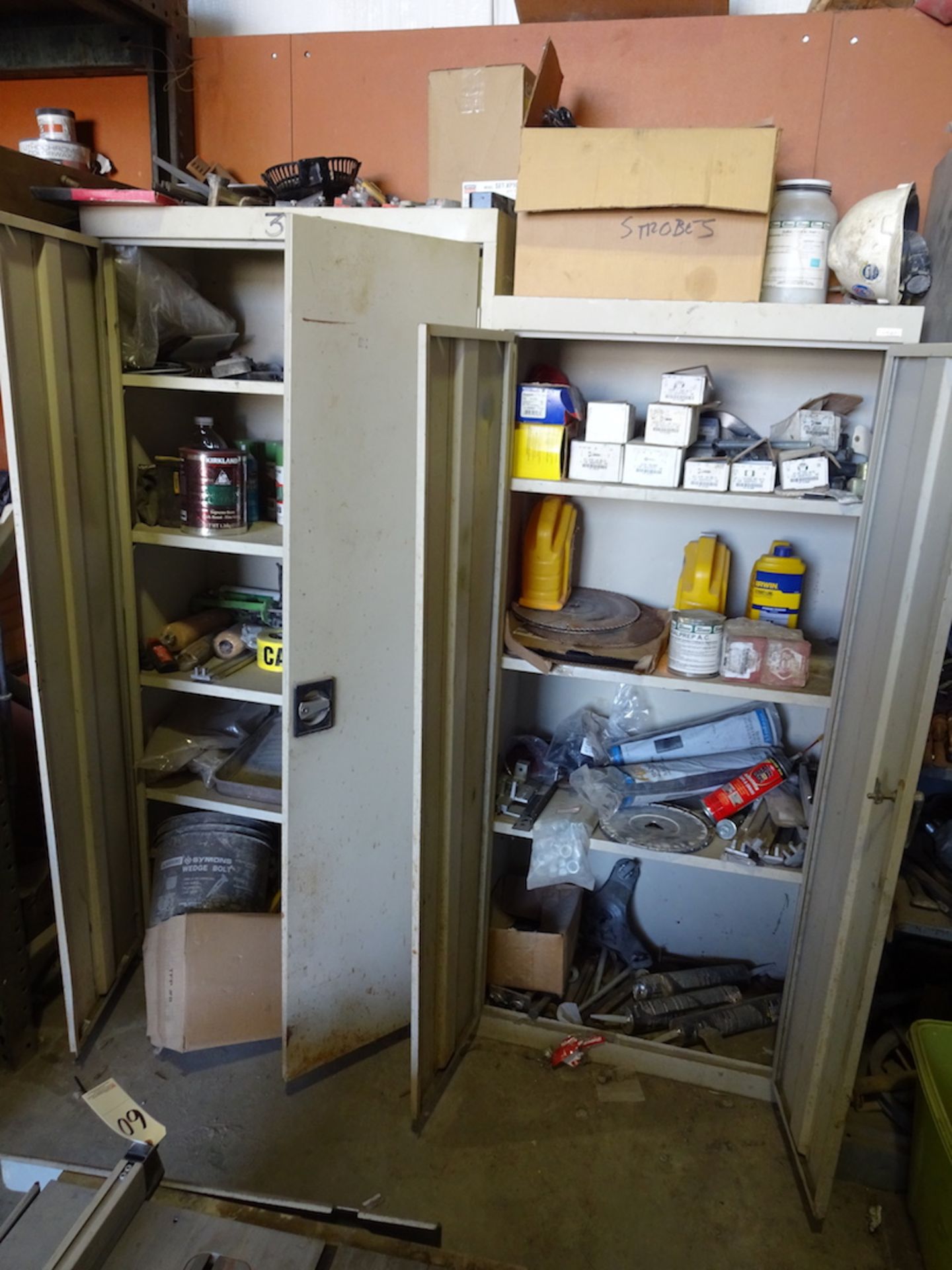 (2) TAN METAL TWO DOOR CABINETS WITH CONTENTS