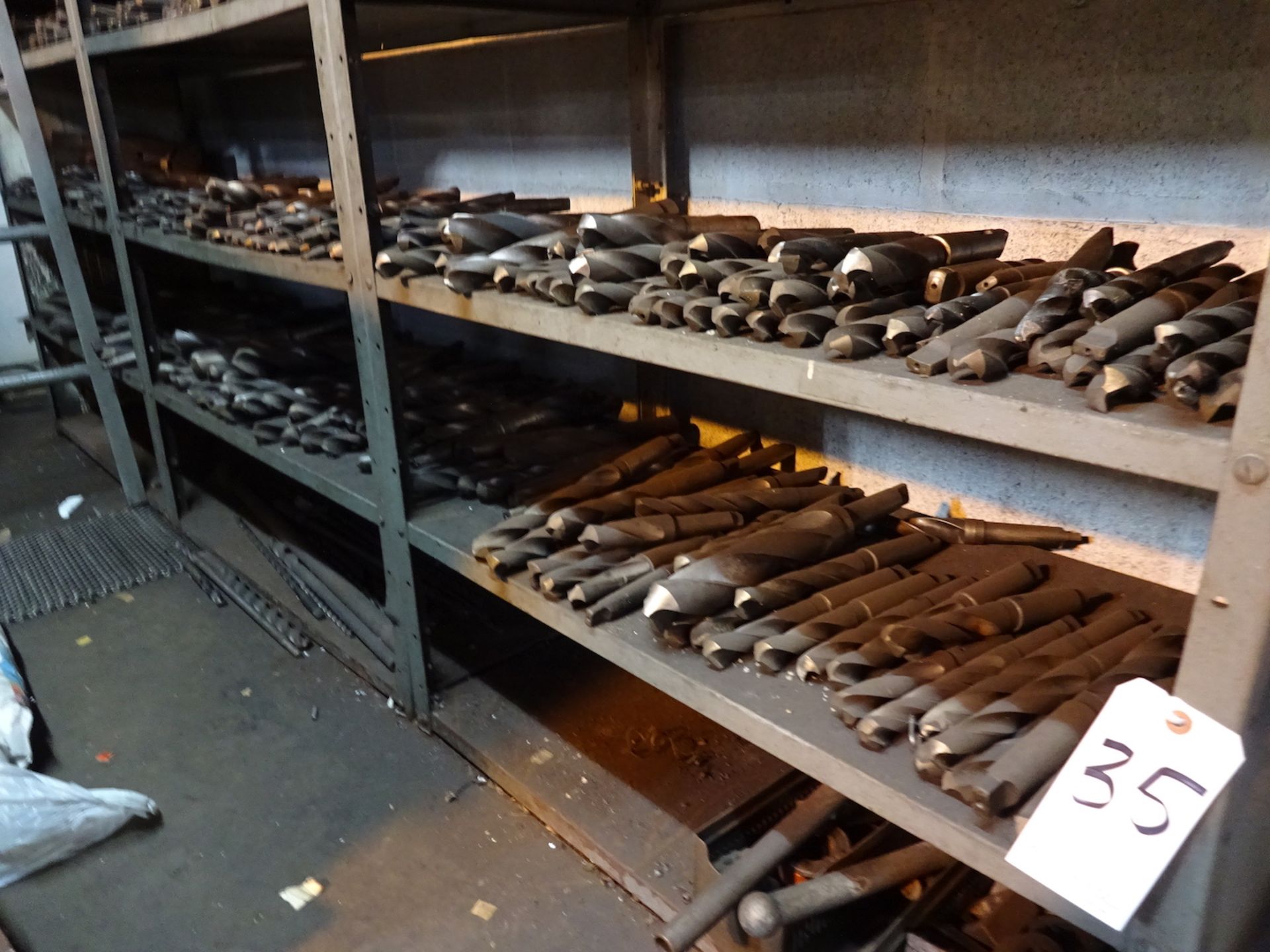 LOT: Assorted Large Drills on (6) Shelves