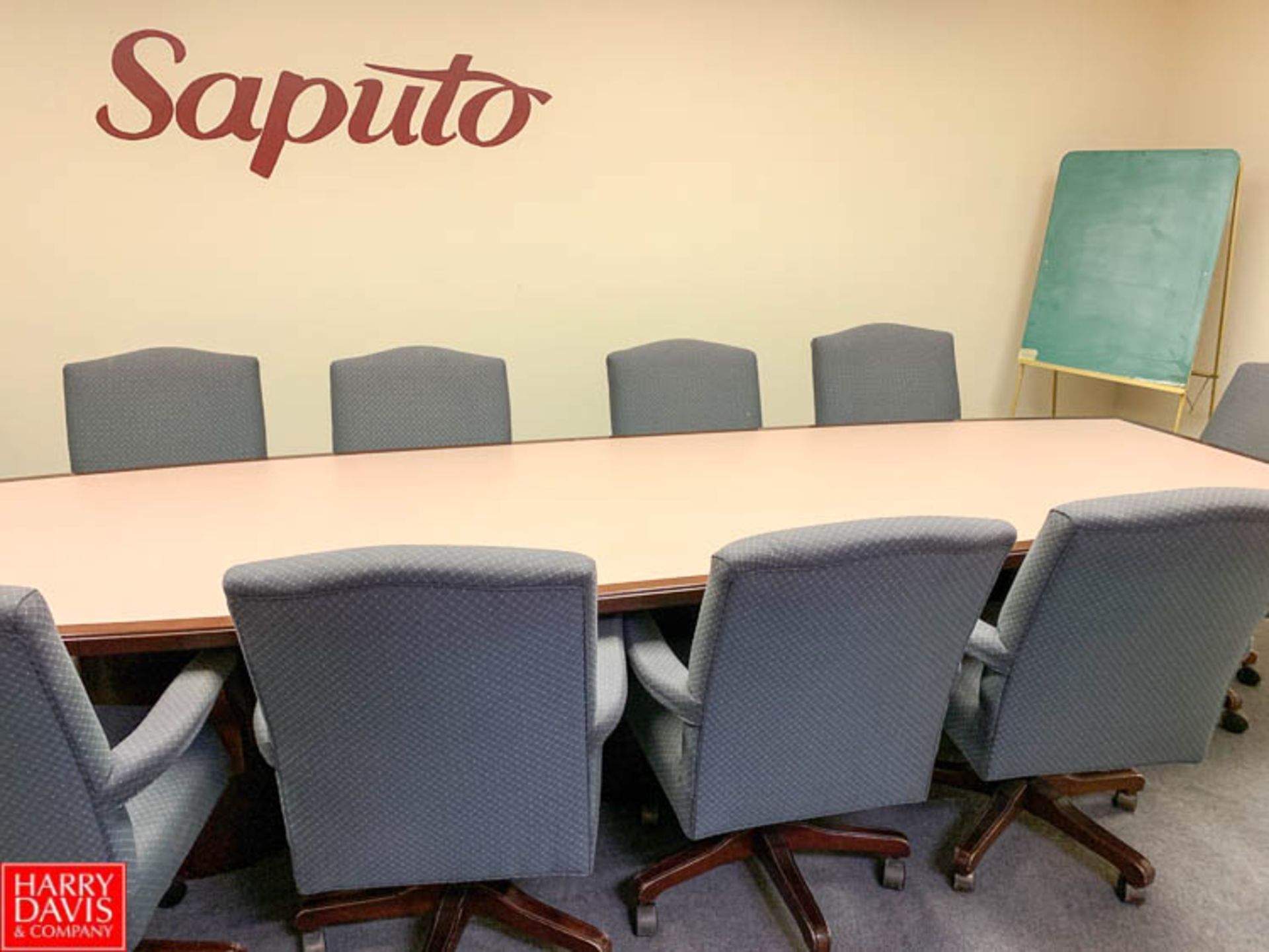 Conference Table with (10) Upholstered Chairs, (2) Base Cabinets, and Display Board - Rigging Fee: $