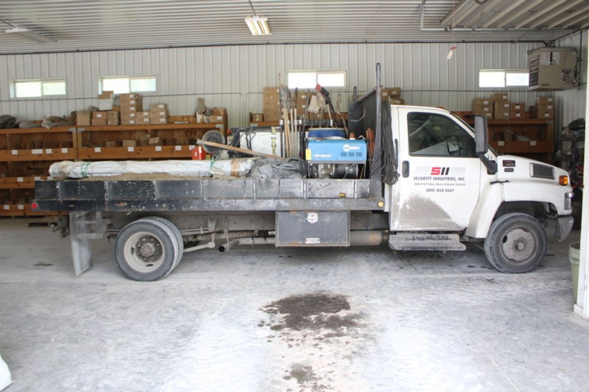 2005 GMC MODEL C4500 FLAT BED TRUCK, VIN 1GDE4C1255F516303, 14' WOOD DECK WITH UTILITY BOX,