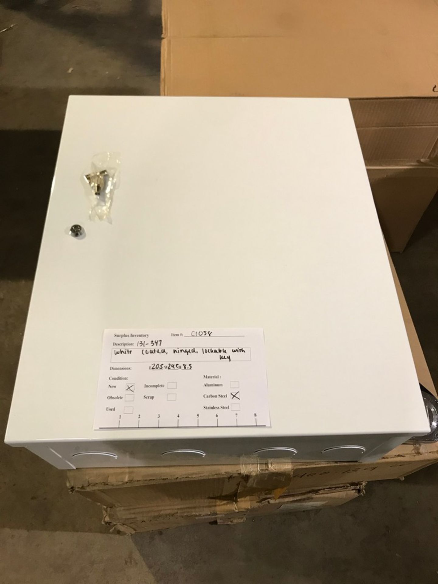 METAL CABINET , CARBON STEEL, CONDITION NEW 20.5 X 24.5 X 8.5 WHITE COATED, HINGED, LOCKABLE WITH