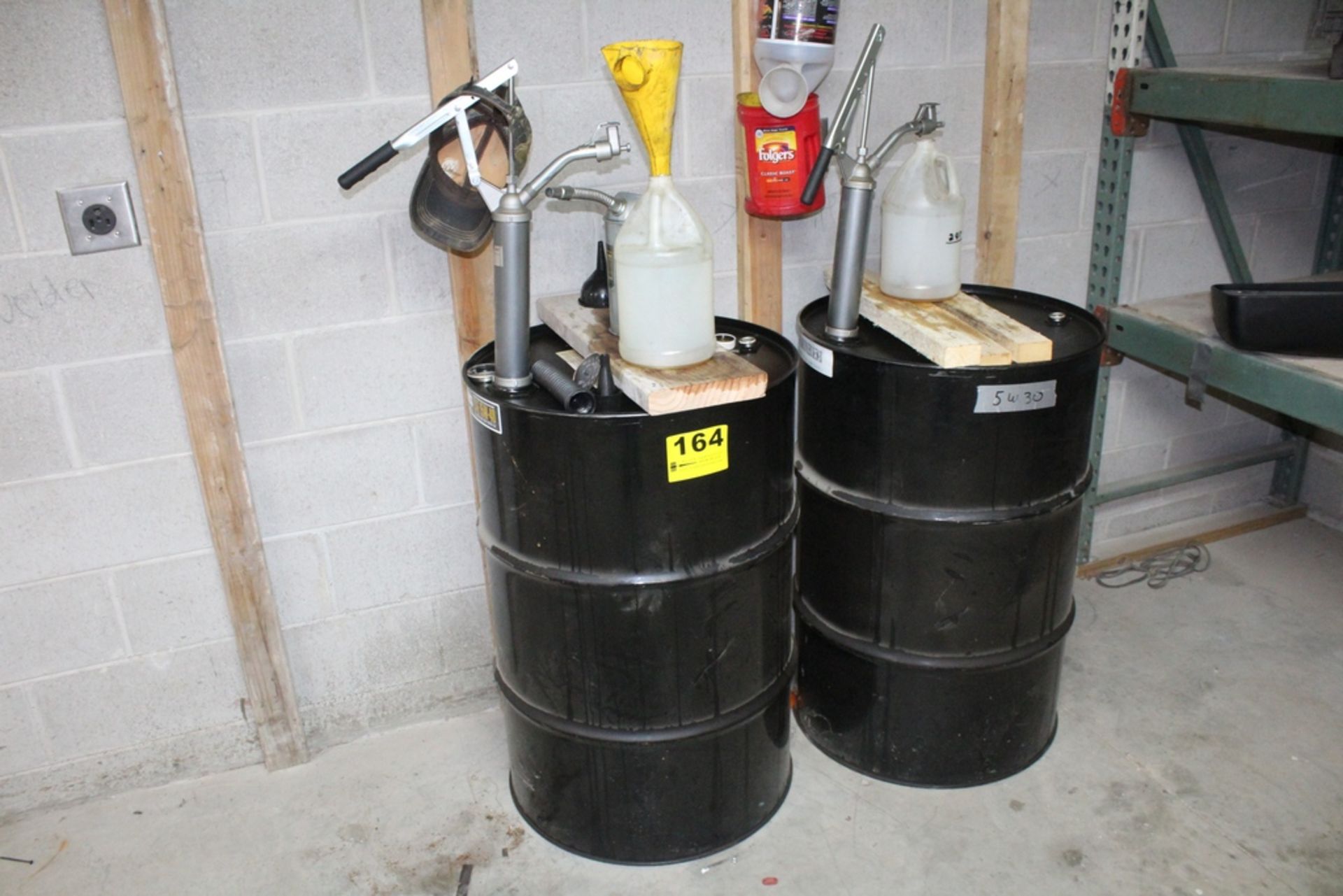 55 GALLON DRUMS OF 15 W-40 1/4 FULL AND 5 W-30 3/4 FULL