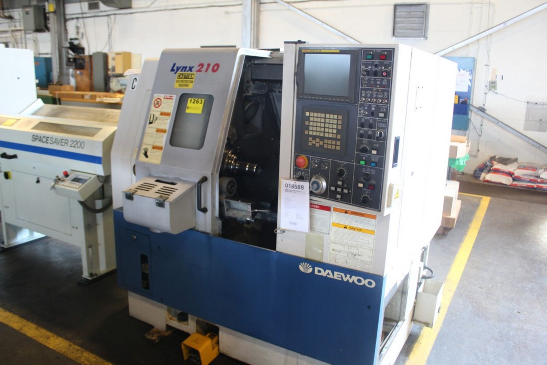 DAEWOO MODEL LYNX 210A CNC TURNING CENTER, S/N L2103410 (2003) SWING OVER BED: 18.11", SWING OVER