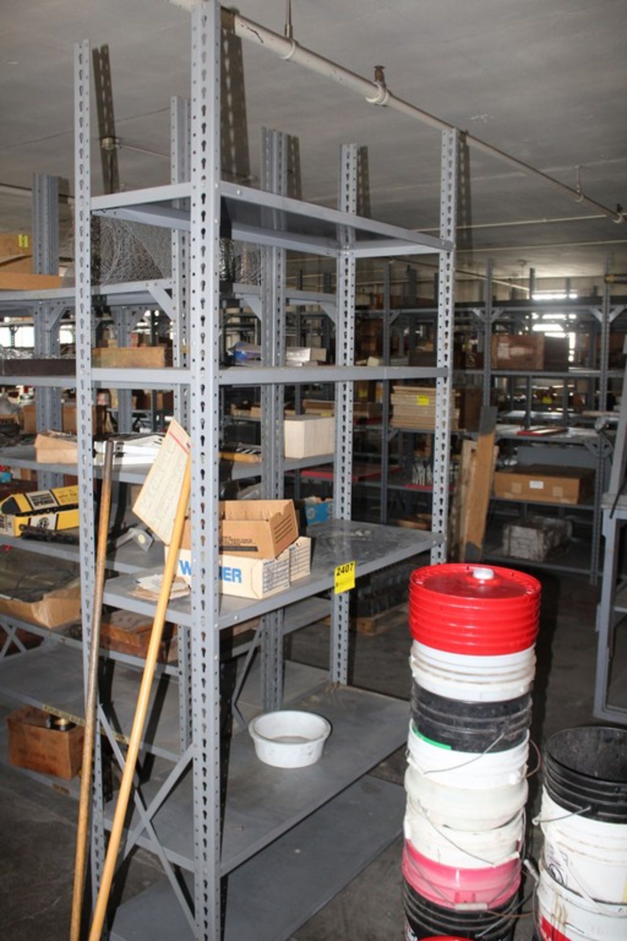 2 SECTIONS OF ASSORTED SIZED ADJUSTABLE METAL SHELVING UNIT