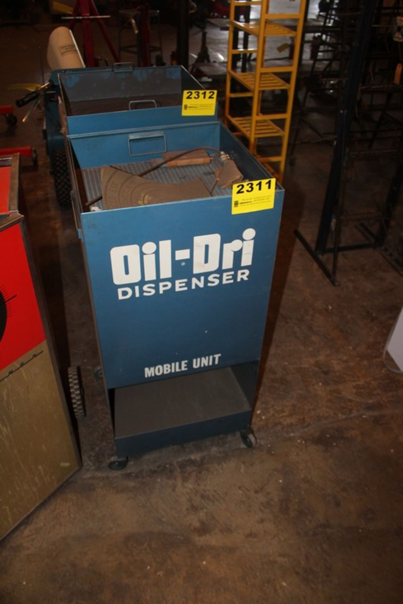 PORTABLE OIL-DRY DISPENSER