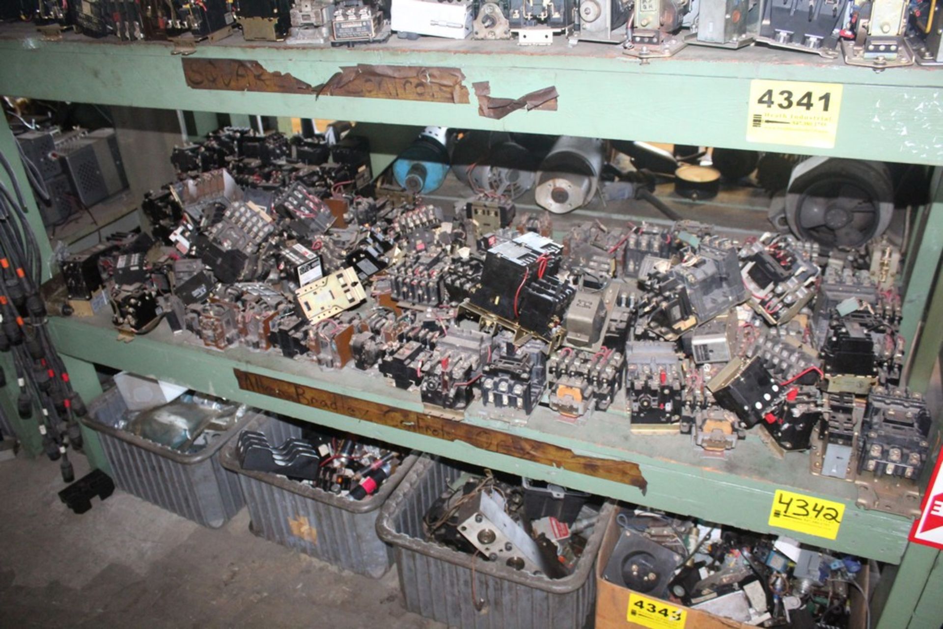 LARGE QTY OF ELECTRICAL BREAKER-RELAYS ON SHELF