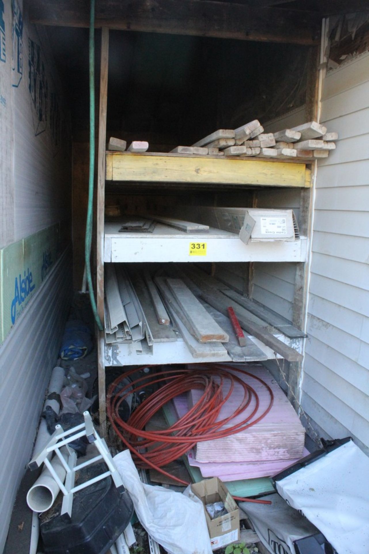 ASSORTED LUMBER, INSULATION, AND MISC. ON SHELVING UNIT