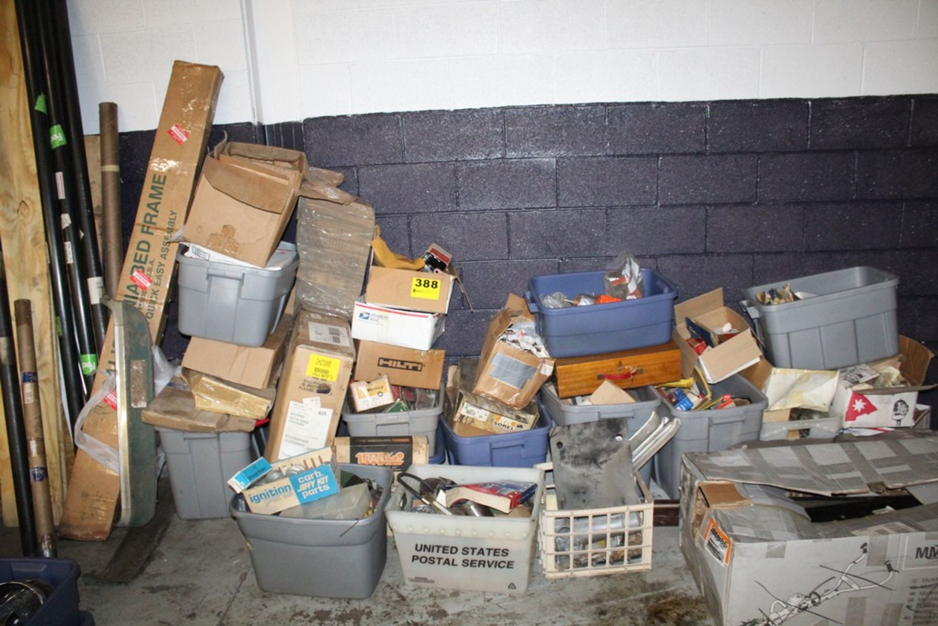 LARGE QTY OF VINTAGE CAR PARTS IN TUBS & BOXES AGAINST WALL