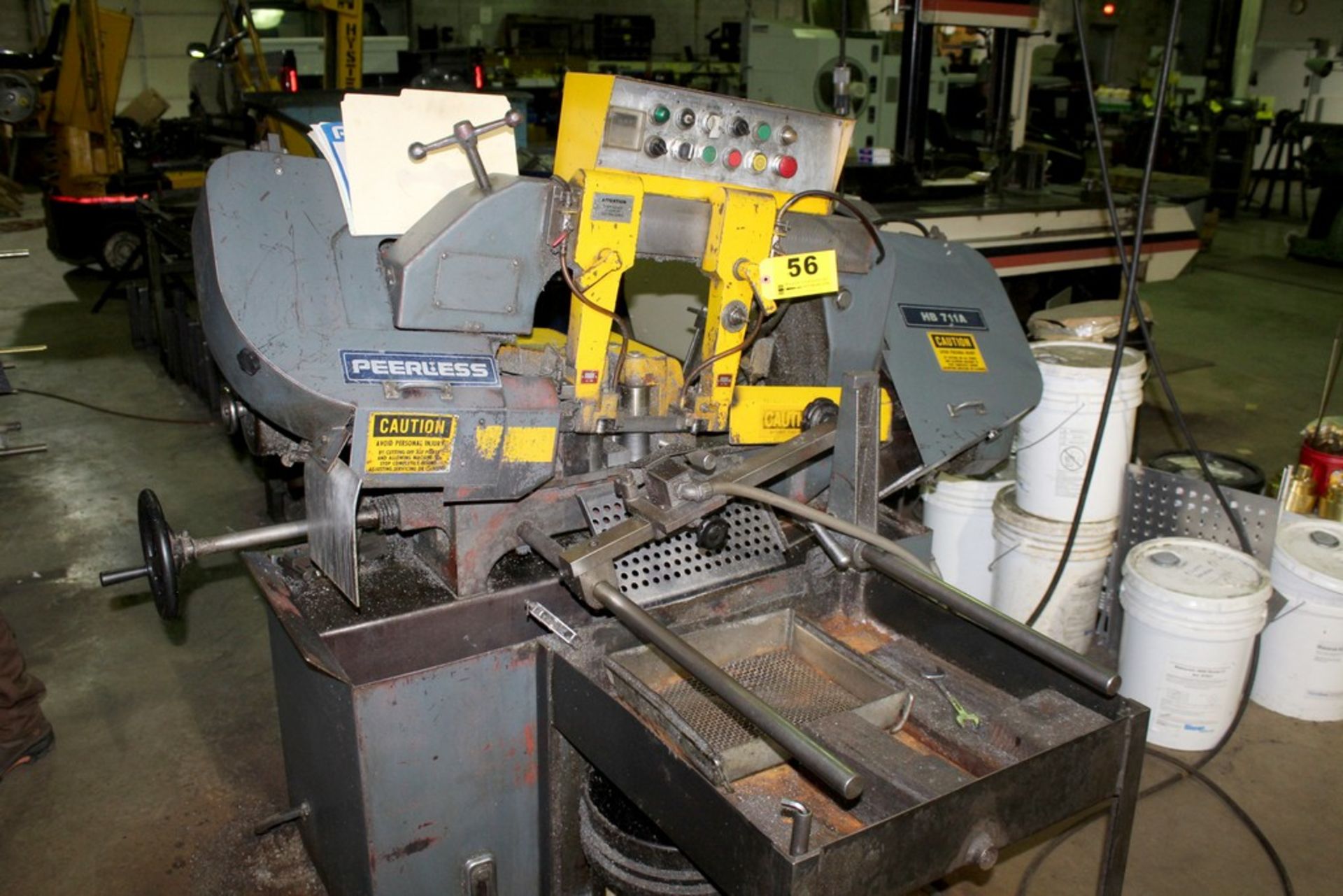 PEERLESS HB711A BANDSAW WITH ROLLER CONVEYOR AND STOCK STAND