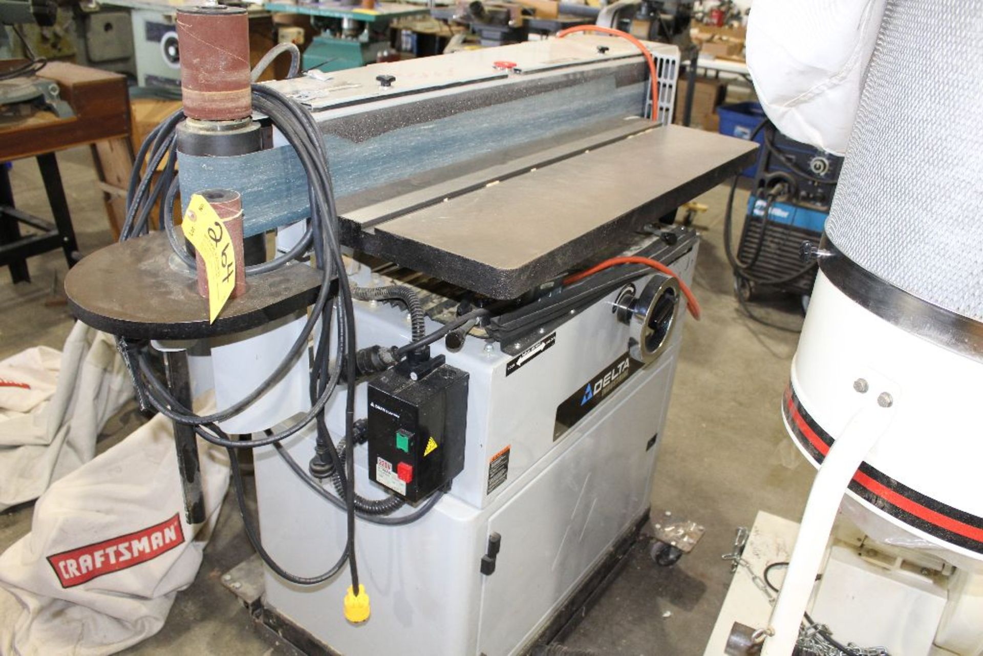 Delta ocillating Edge sander, model 31-396 on cart.