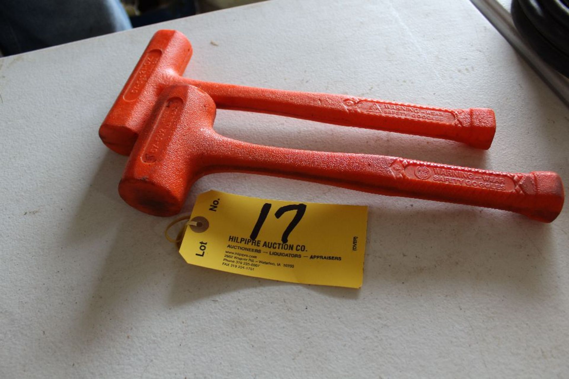 (2) Dead blow poly hammers.