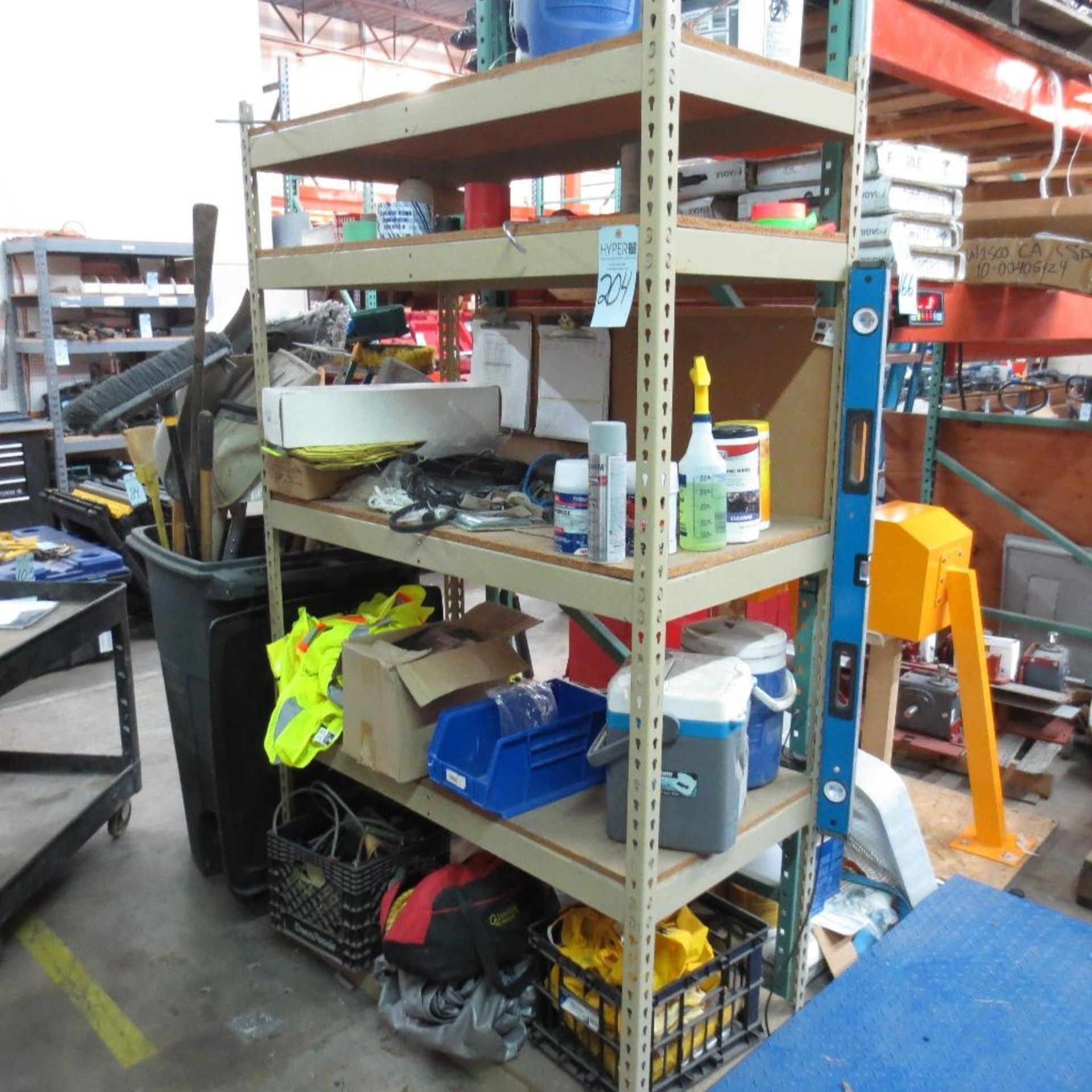 Shelf with Safety Vest and Contents