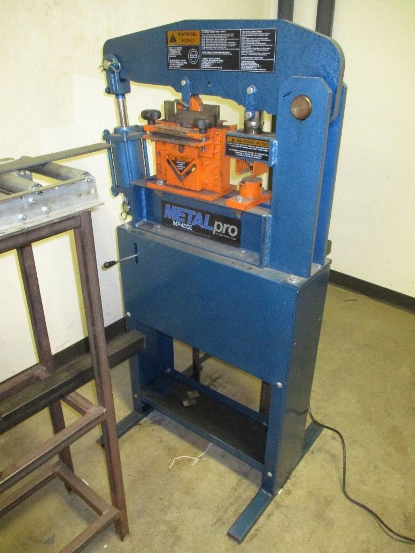 Metal Pro MP400 iron worker with rolling table feeder