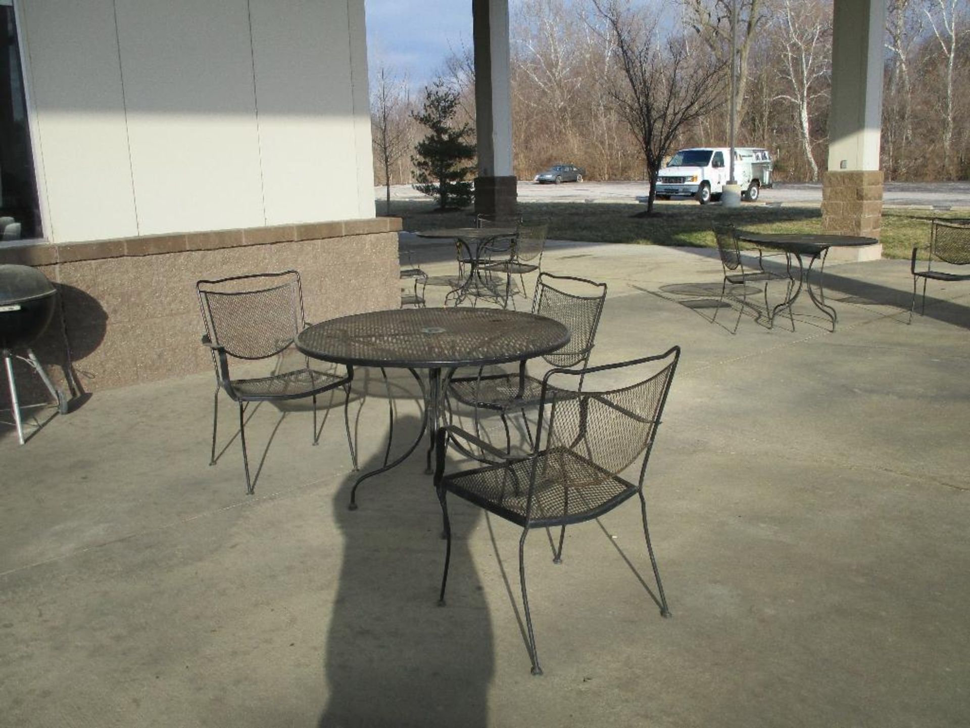 Out side Furniture ( 32 metal chairs, 8 round metal tables, 2 BBQ pits) - Image 4 of 4