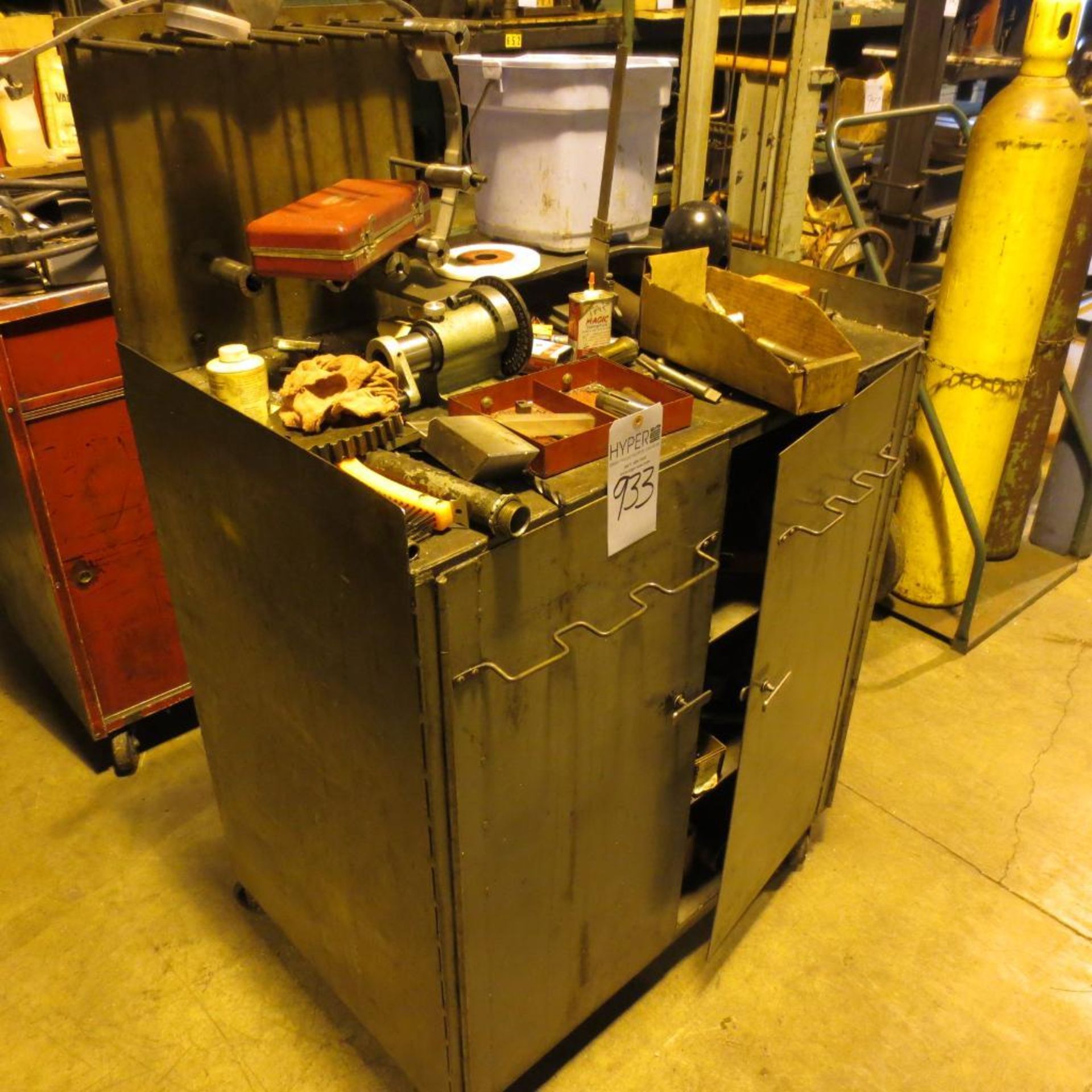 Metal 2 door rolling cart with contents